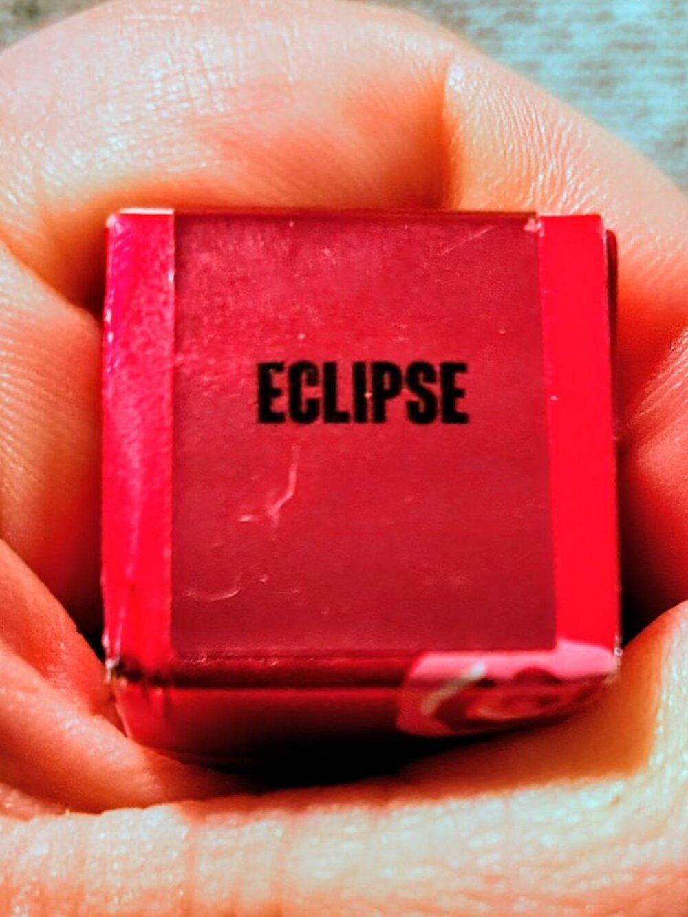 Lime Crime Eclipse is a muted, earthy-toned metallic